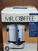Box front showing Mr. Coffee CBTU45 commercial coffee urn with stainless steel body and 45 cups capacity.