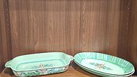 Photo of 16-inch rectangular ceramic baker and one oval serving platter showing color and pattern.