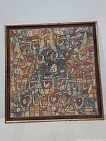 Full view of large abstract canvas wall art framed in gold bamboo style frame, showing overall colors and design.