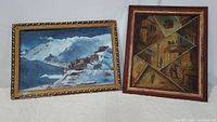 Overview of two framed oil paintings: one alpine mountain snow scene, one city street scene with geometric divisions.