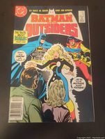 Front cover of Batman and The Outsiders comic book, issue 16, showing main characters and comic details.
