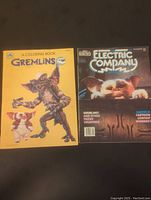 Yellow coloring book with a Gremlin and Gizmo on the cover titled 'A Coloring Book: Gremlins'.