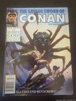 Full front cover of The Savage Sword of Conan the Barbarian issue #183 showing Conan fighting a giant spider and promotional text for storylines.