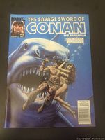 Full front cover of The Savage Sword of Conan the Barbarian Volume 1 Number 192 showing Conan with a woman and a shark in an underwater scene, comic in excellent condition.