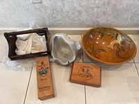 Four wooden items: Cape Cod clam style basket, carved gray painted basket, Granville oval wooden picture bowl with finish damage, two small wooden boxes with logos.