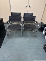 Front view of all four chairs arranged in two rows