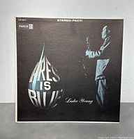 Front cover of the vinyl LP "Pres Is Blue" showing Lester Young playing saxophone and the title in large typography