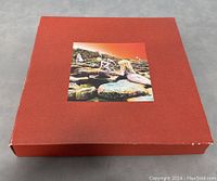 Red outer box with 'Houses of the Holy' album cover