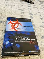 Photo of sealed box package of Malwarebytes Anti-Malware Pro software showing branding and product info.