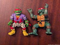 Two Playmates Raphael TMNT 1980s action figures shown front side.