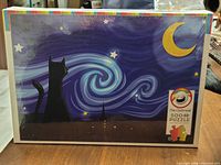 Front view of the unopened puzzle box showing the artwork and branding