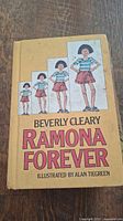 Front cover of the Ramona Forever hardcover book by Beverly Cleary with illustrated character