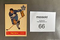 Front side of 1957-58 Parkhurst hockey card featuring Hugh Bolton in Toronto Maple Leafs uniform, card #13.