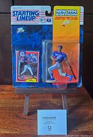 Full view of Joe Carter figurine and card in original 1994 Starting Lineup packaging with visible label and graphics.