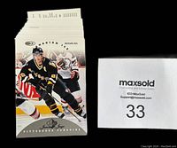 Stack of Donruss Canadian Ice hockey cards featuring Jaromir Jagr of Pittsburgh Penguins on top, dated 1996-97 the set is complete with 150 cards.