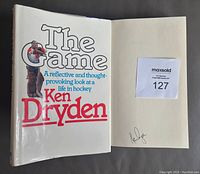 Front open view showing title page of 'The Game' by Ken Dryden and autograph on the page.