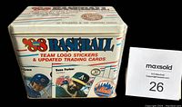 Front and side views of the sealed 1988 Fleer Baseball Update tin set showing player images and product branding.
