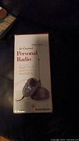 Front view of sealed box with image and branding showing 14-Channel Personal Radio by RadioShack