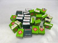 Top-down view showing 30 unopened bearing boxes including both Fafnir and INA brands.