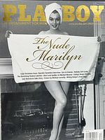 Close up of the magazine cover showing Marilyn Monroe holding a towel with The Nude Marilyn title.