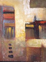 Close-up of the textured abstract painting showing details of the artist signature and raised textures.