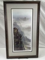 Full frontal view of the framed vertical print showing the artwork of cormorants on a cliff with misty mountains in the background.
