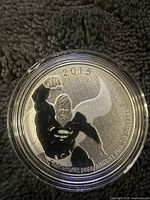 Obverse side showing Superman design, year 2015, and silver purity markings.
