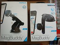 Two boxed Naztech MagBuddy Universal Magnetic Phone Mounts, Dash and Dash 600 models