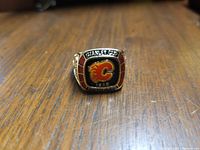 Front view of the ring showing the Stanley Cup 1989 and Calgary Flames logo.