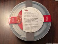 Top view of the mixing bowls set packaging detail showing brand Master Chef and package information listing 12 pieces with lids.