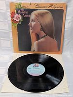 The vinyl LP record removed from the sleeve, showing the label and disc surface in good condition.