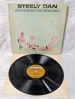 Front cover and vinyl record visible showing label and overall condition of the LP