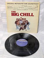Front cover of The Big Chill soundtrack showing the cast image and track listings including various classic artists.