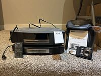 Overview of Bose system, remote, Nikon camera, case and manual