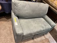 Folded sofa in blue-grey microfiber upholstery