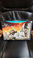 Sealed box of Disney Infinity Star Wars 3.0 Starter Pack for Wii U showing front graphics and branding.