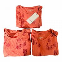 Three folded red cactus print t-shirts stacked with one tag visible, brand Goodfellow & Co