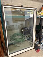 Front view of luxury window showing full glass pane and black frame