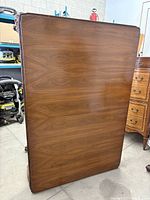 Tabletop viewed flat showing mahogany veneer grain