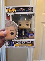 Front view of boxed Funko Pop featuring Lord Krylar from Marvel's Quantumania, numbered 1218 with limited edition exclusive sticker.