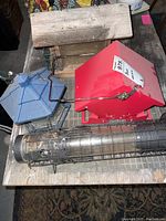 Overhead view of the four bird feeders showing different materials and styles.