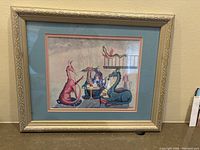 Front view of the framed print showing dragons having a tea party.