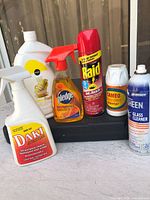 All six cleaning products grouped together showing labels