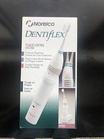 Front of boxed Norelco Dentiflex Plaque Control System model HP400