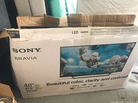 Sony Bravia KDL-48W650D TV retail box front showing model, size and marketing graphics