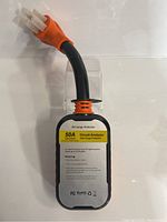 Front-facing view of the circuit analyzer portion showing label with 50A rating and warning information.