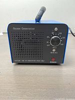 Front view of ozone generator showing timer dial and ventilation holes