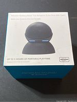 Photo showing front of sealed box of Echo Mission Battery Base for Amazon Echo Dot 4th Gen with product image and text details.