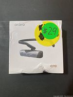 Front of sealed box showing Ordro EP8 camera and headband image, product name.