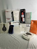 All new items including 4K camera, content creator kit, earbuds, headphones, speaker, microphone, power banks, screen protector, and watch